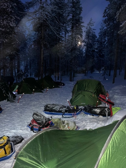 A group of tents in the snow

Description automatically generated with low confidence