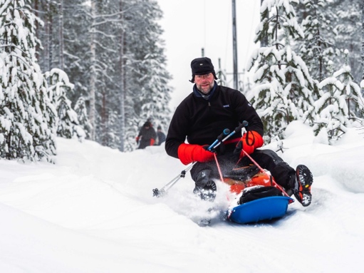 A person sledding down a hill

Description automatically generated with medium confidence