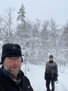 A person taking a selfie in the snow Description automatically generated with low confidence